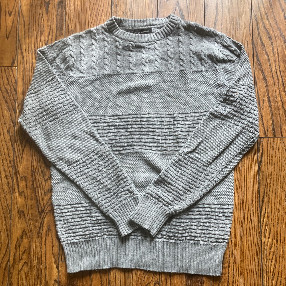 Grey knit sweater.
